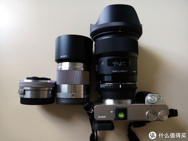 从左至右：E16-50/f3.5-5.6、E50/f1.8、Sigma 24/f1.4+MC-11