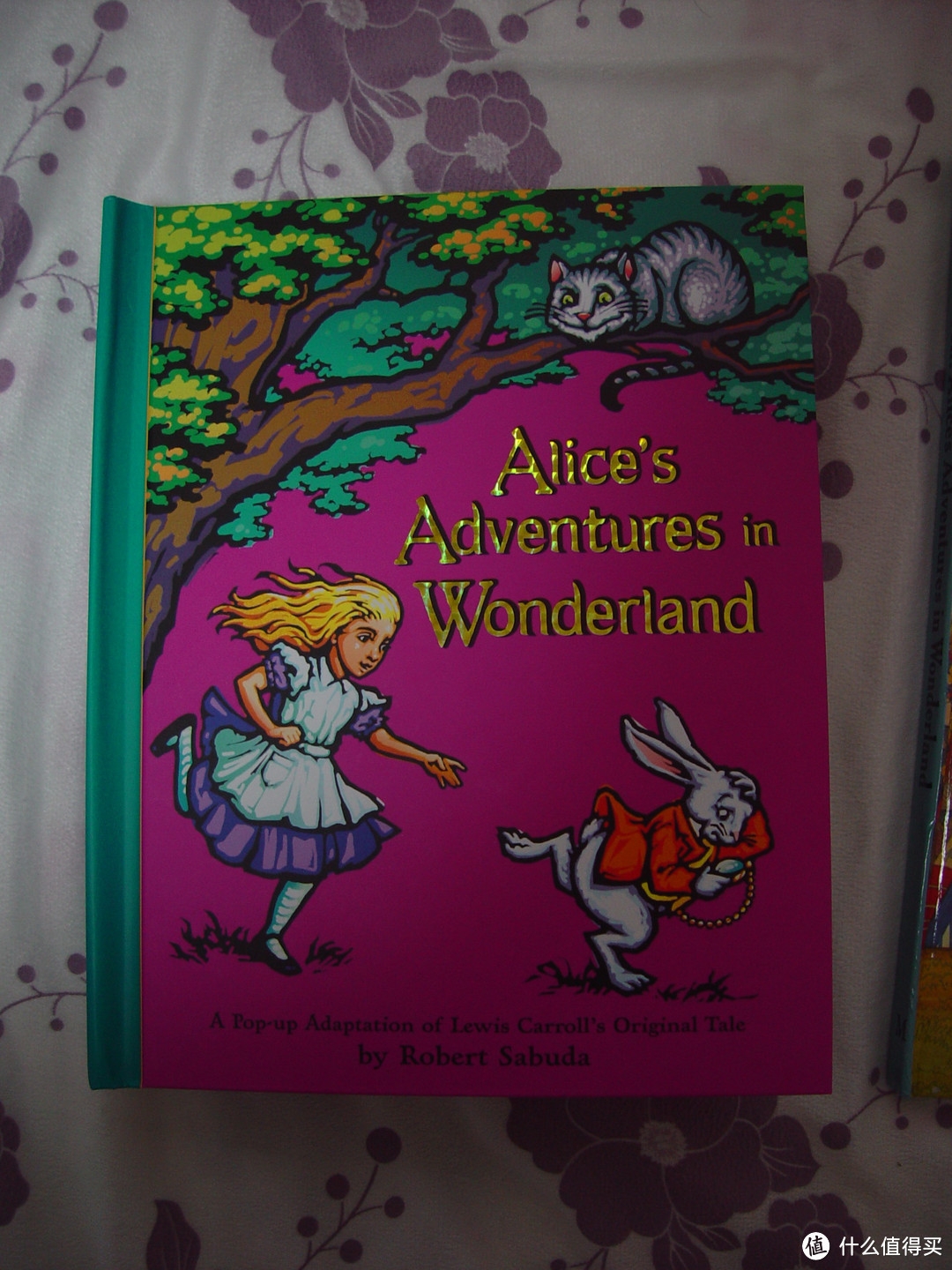 我的立体书收藏之--两版爱丽丝梦游仙境片段比较