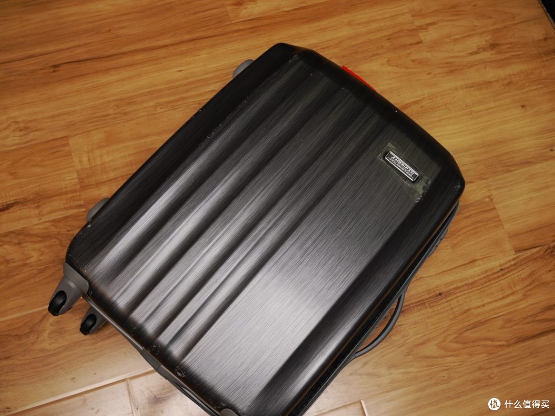 AmericanTourister 美旅箱包 100%PC坚韧时尚炫彩万向轮拉杆箱 40T*49010金属灰24寸 小晒
