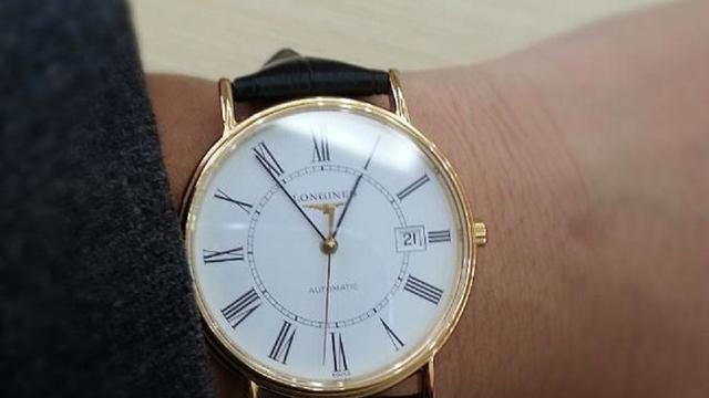 土豪金腕表:longines 浪琴 瑰丽系列 背透机械男表 l4.921.2.11.