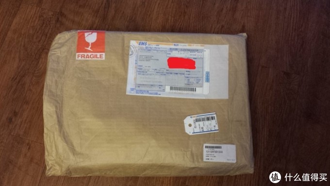 到手包裹图,上面有ems单。 到手包裹图,上面有ems单。