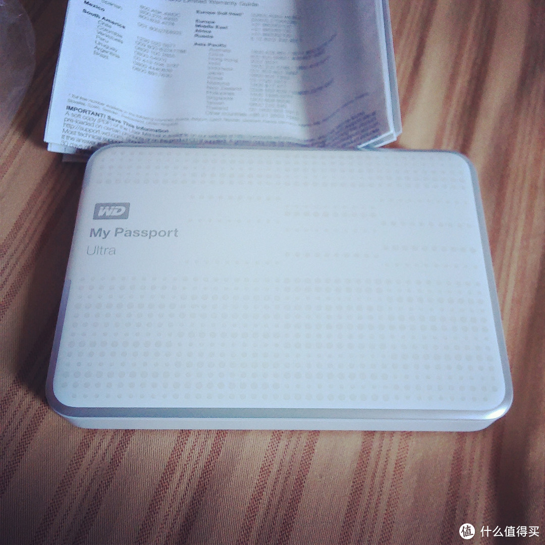 收集癖的爱与恨：玉面小白龙！WD 西部数据 My Passport Ultra USB3.0 1TB 移动硬盘 WDBZFP0010BWT-PESN 