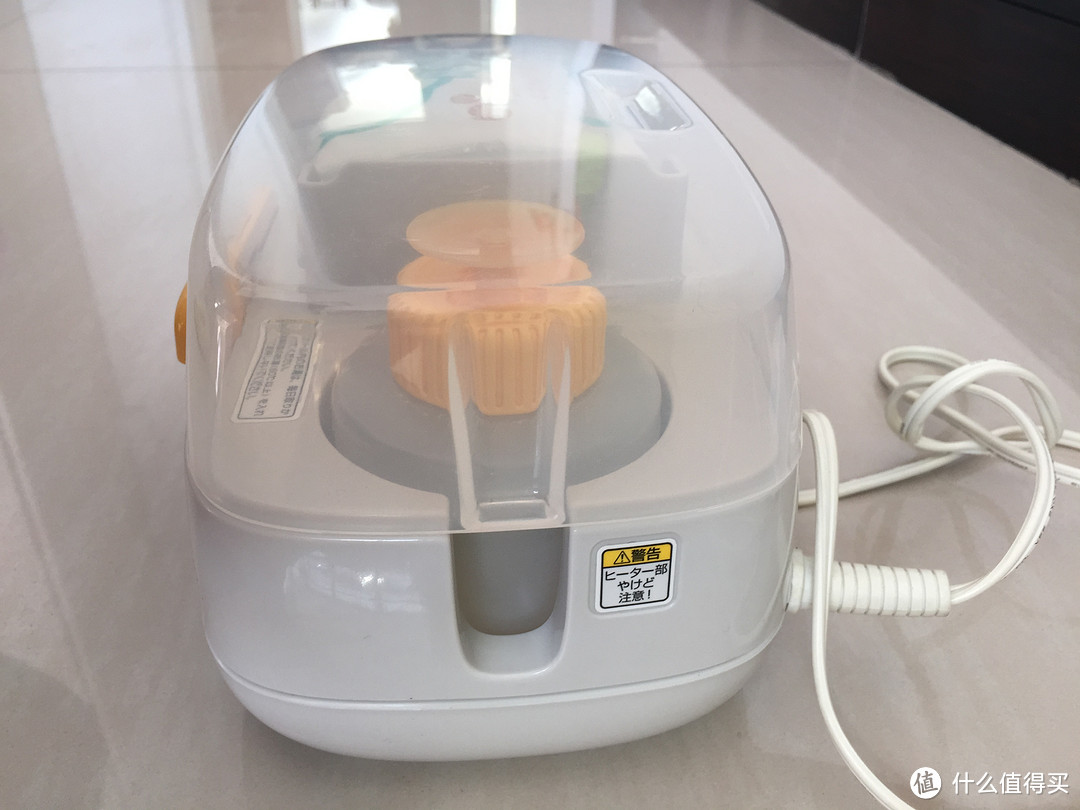 为了娃温暖的屁屁：日淘 Combi 康贝 出水型湿巾加热器