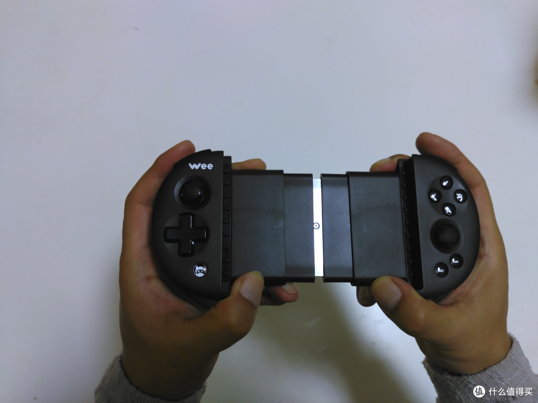 游戏老鸟的温故神器飞智wee拉伸手柄