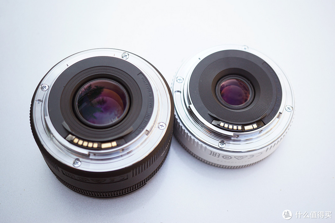 佳能aps-c单反定焦镜头选40mm 2.8饼干 or 50mm 1.8痰盂?