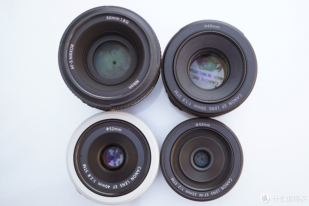 佳能APS-C单反定焦镜头选40MM 2.8饼干 or 50MM 1.8痰盂？