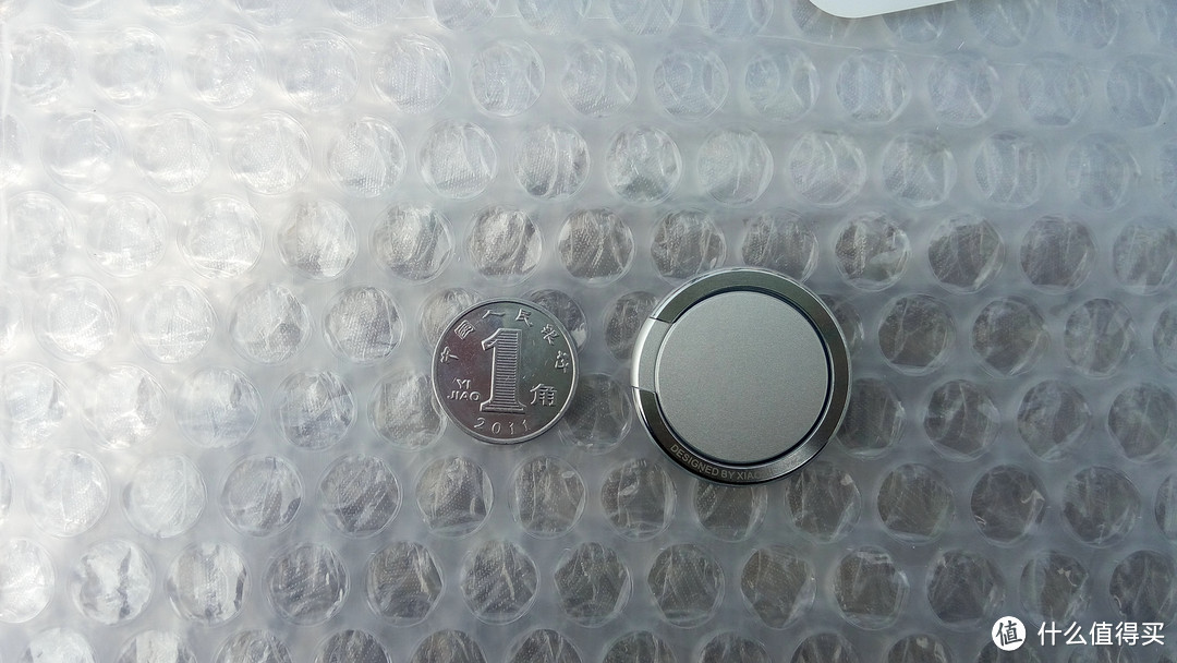 小米指环与一角硬币大小对比
