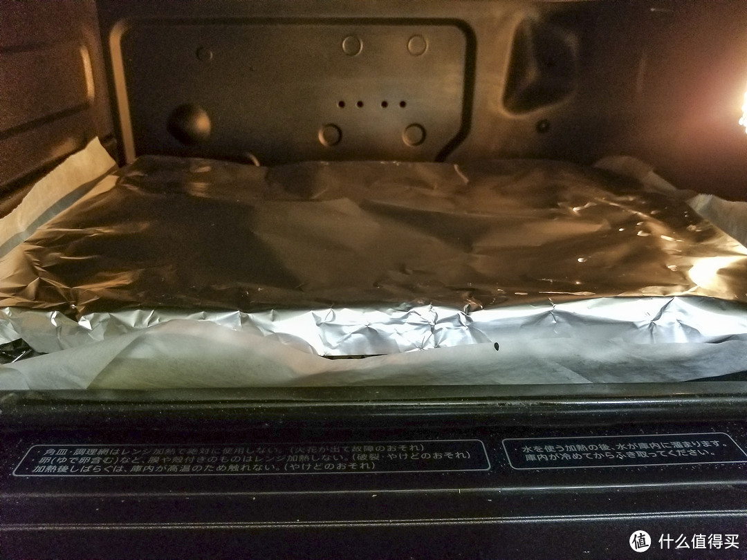 怕烤糊了，加上银箔防止过热。