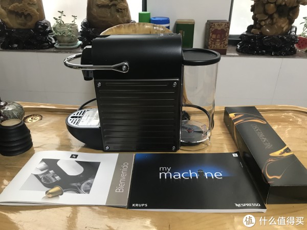 开箱得到咖啡机X1、胶囊X14、说明书X1、胶囊宣传册X1