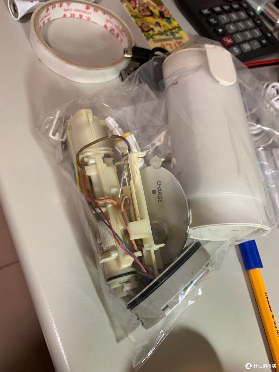 上次报废的冲牙器,留着当遗体捐献者。