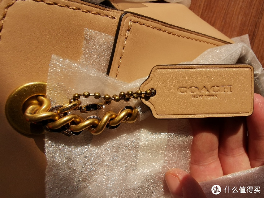 不到550元海淘coach parker女包开箱