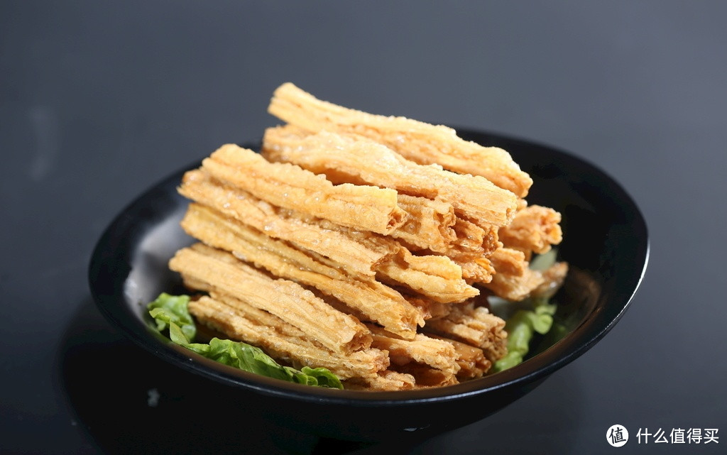 豆制品也是重庆火锅最常见的食材,豆皮有豆子的香,炸腐竹有腐竹的香