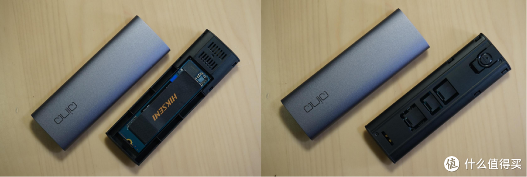 QINQ采用背部按键推出，相比CM400不容易误推；硬盘采用机身连体卡扣进行固定，稍显廉价