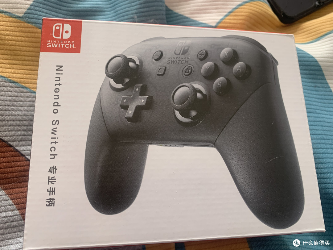 首付2000,月付500,该说不说,switch pro手感真的不错,但还想要额外的一对joycon