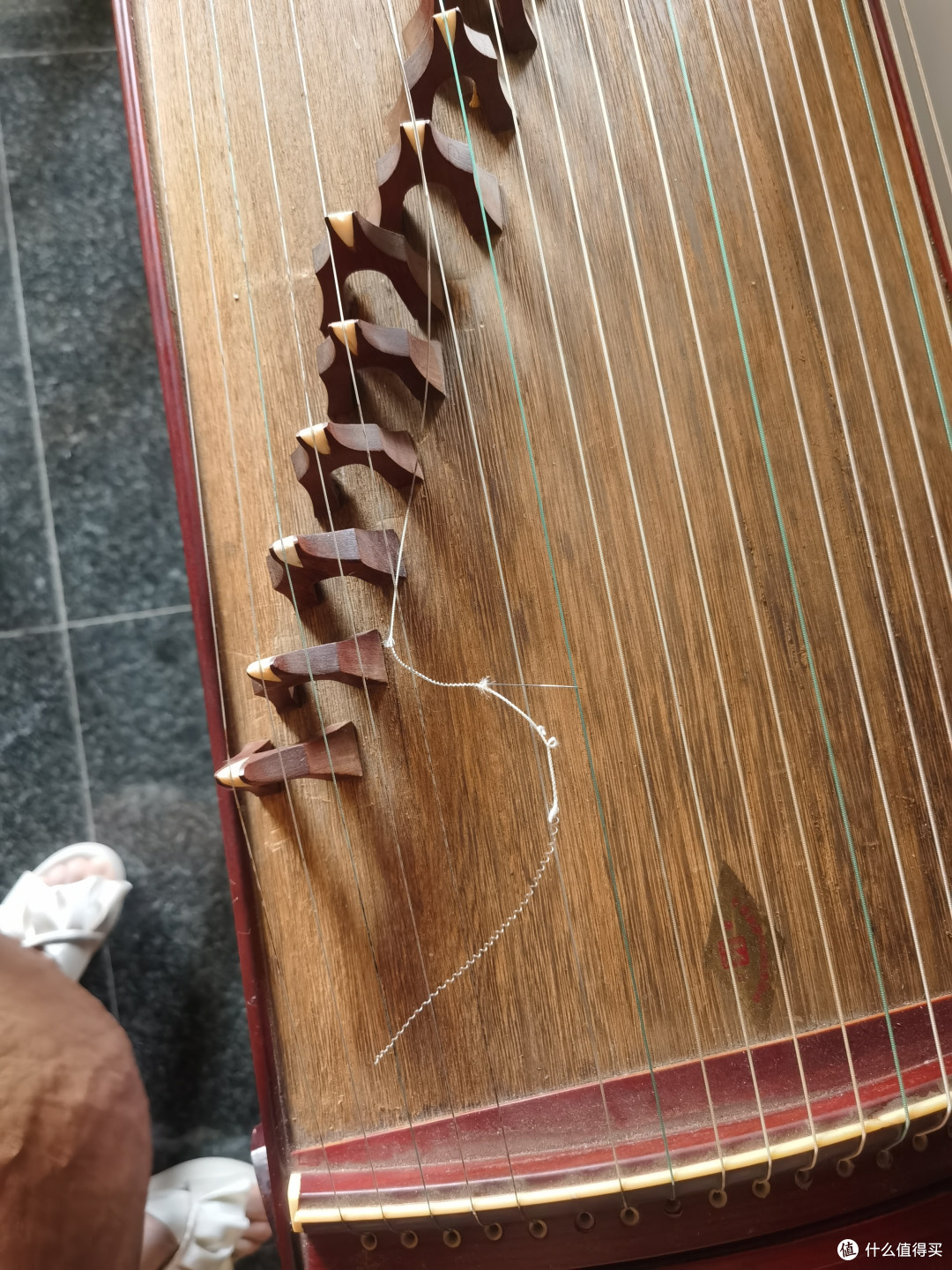 古筝的弦断了，自己换