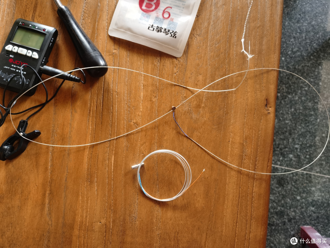 古筝的弦断了，自己换