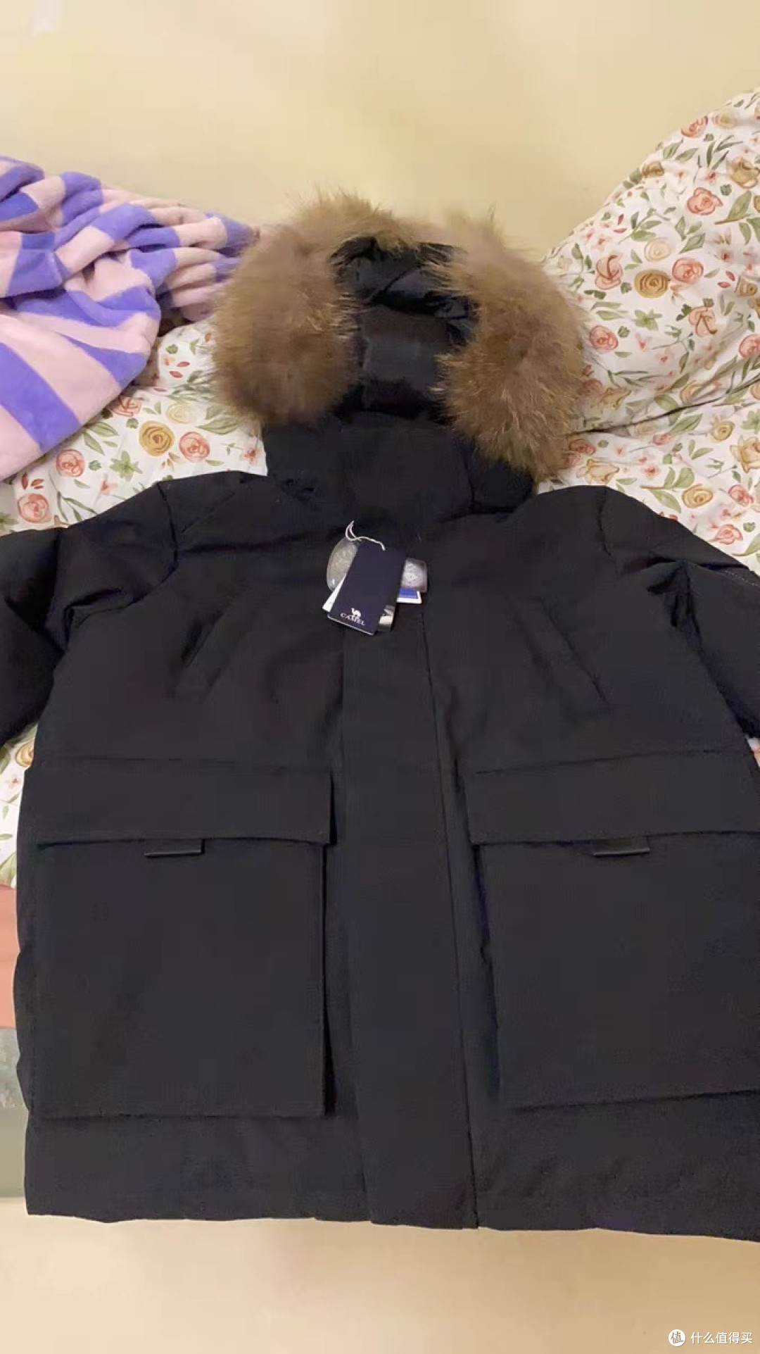 冬季出行就靠骆驼羽绒服