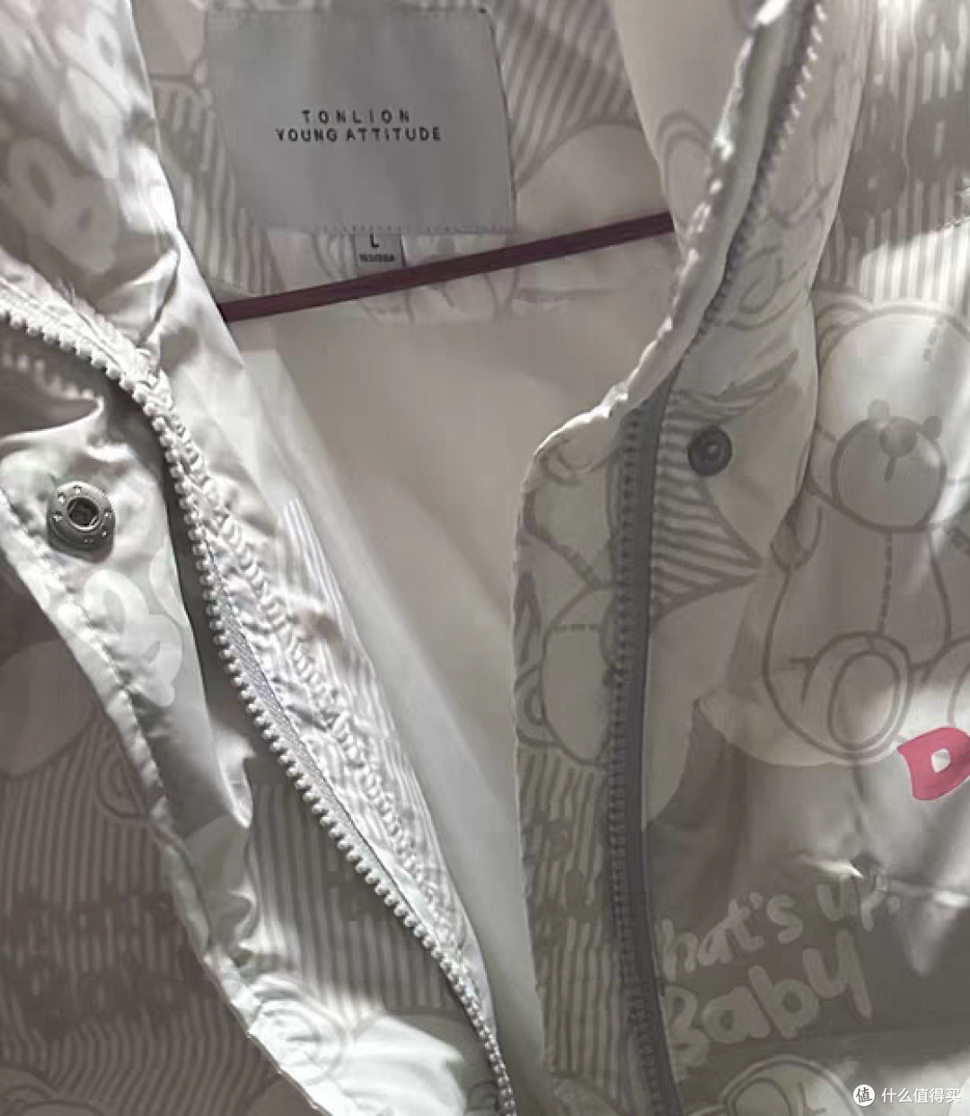 宽松版羽绒服,时尚的简约风
