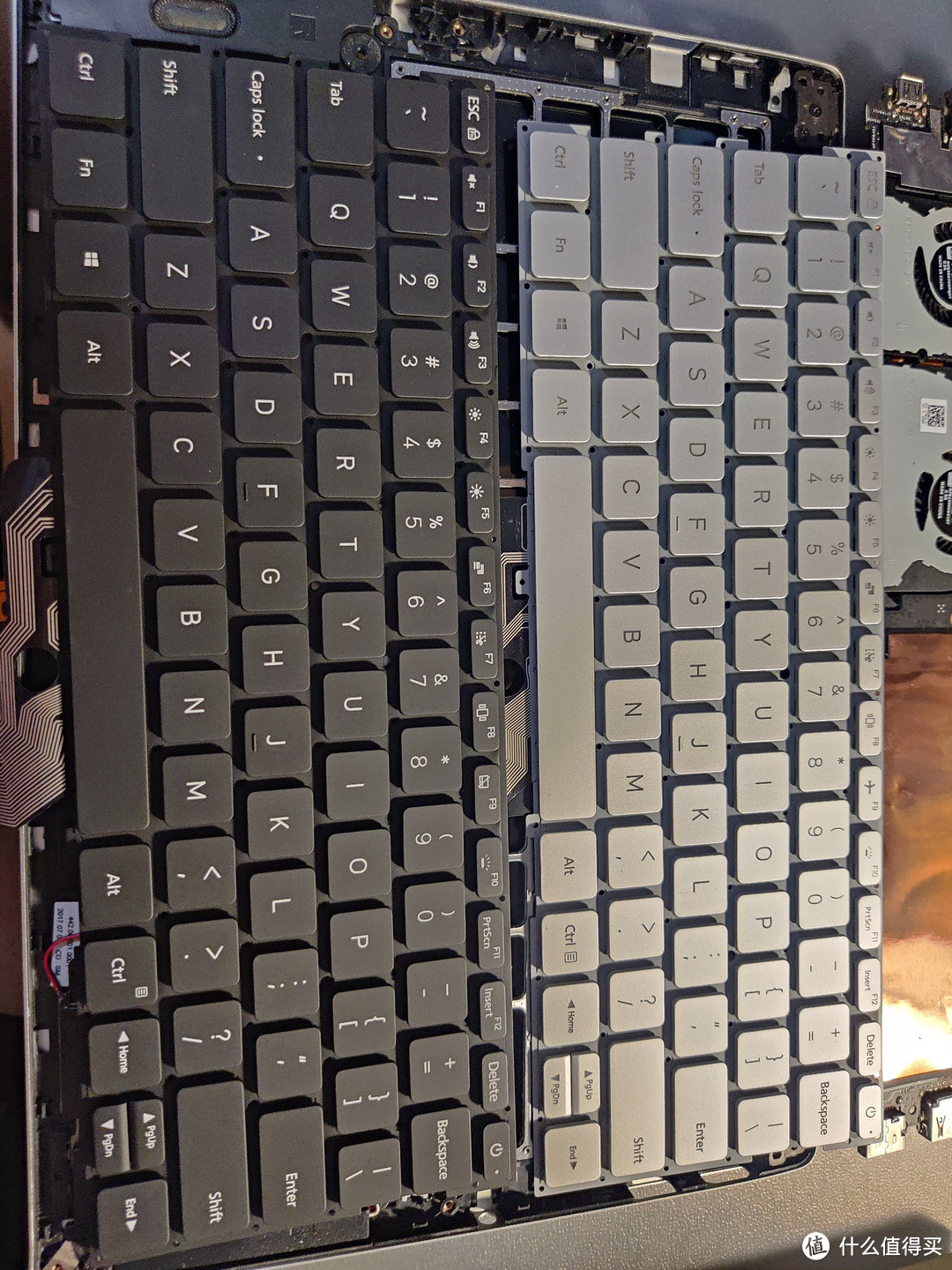 黑色键盘有个F9和原厂不一样，银色是飞行模式，黑色是关闭触控板