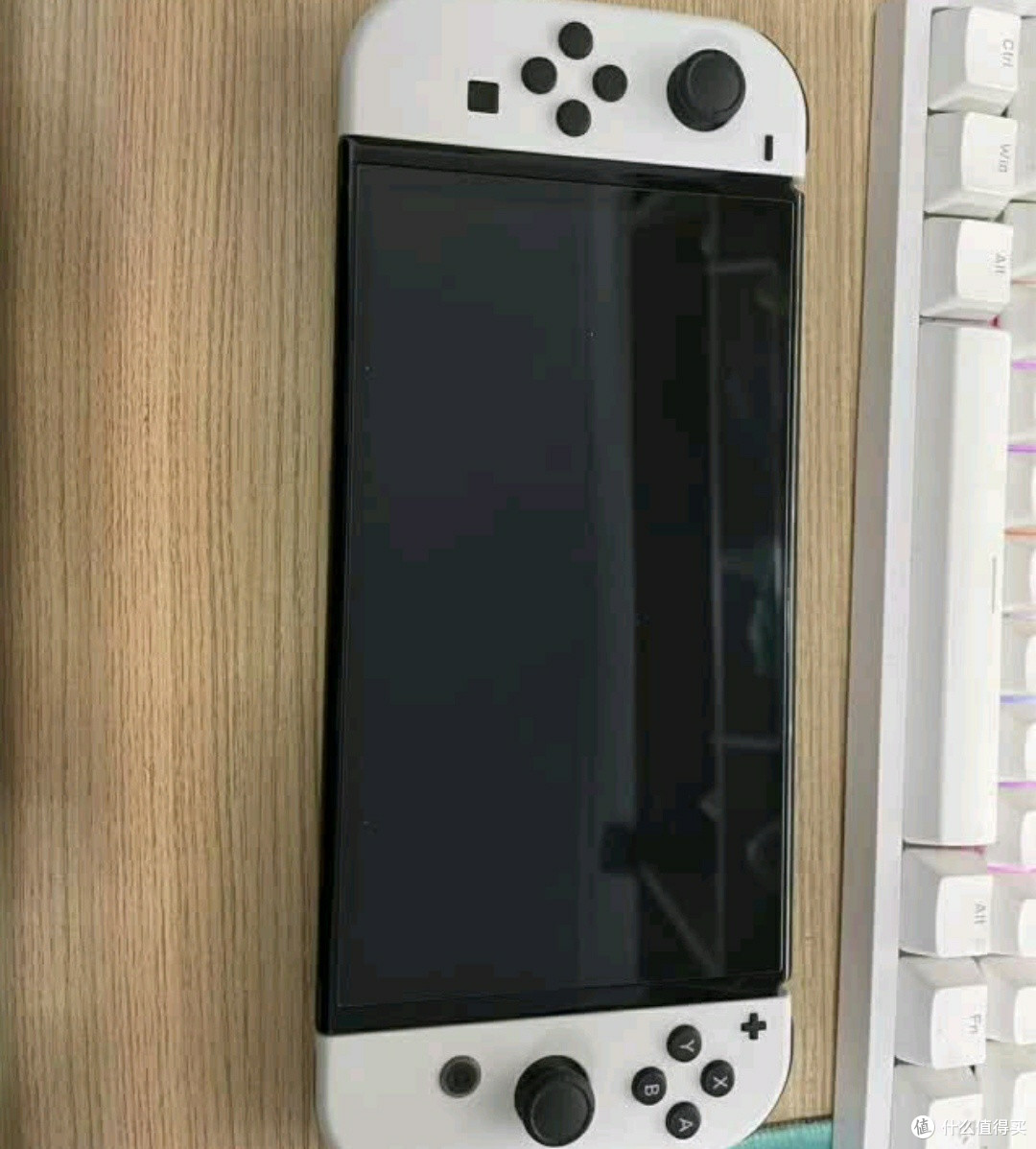 Nintendo Switch日版OLED+国行Pro手柄:游戏爱好者的顶级配置