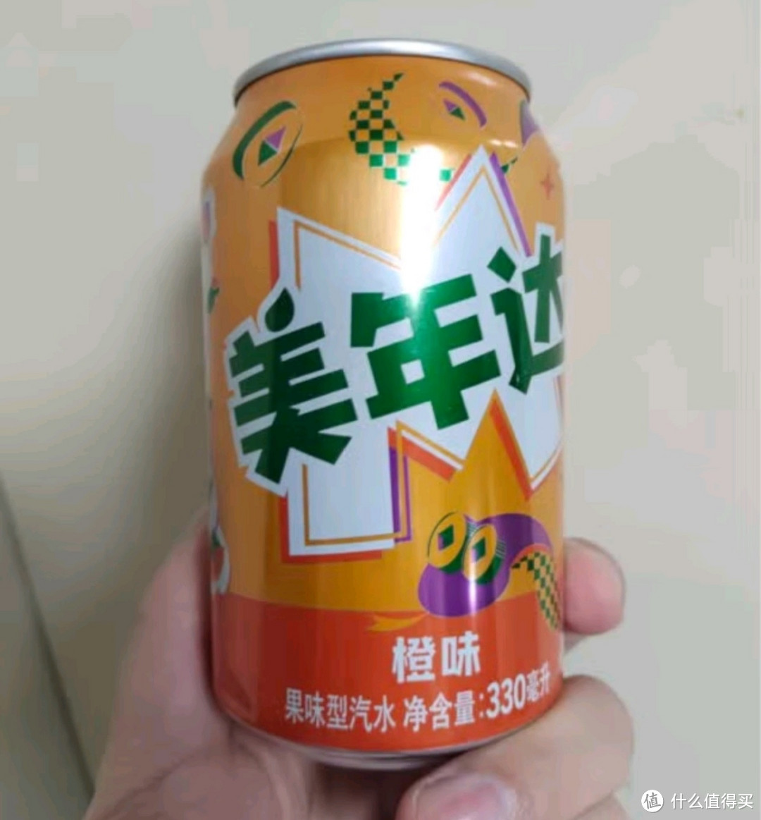 百事可乐美年达橙味碳酸饮料：过年开销中的甜蜜滋味🥤