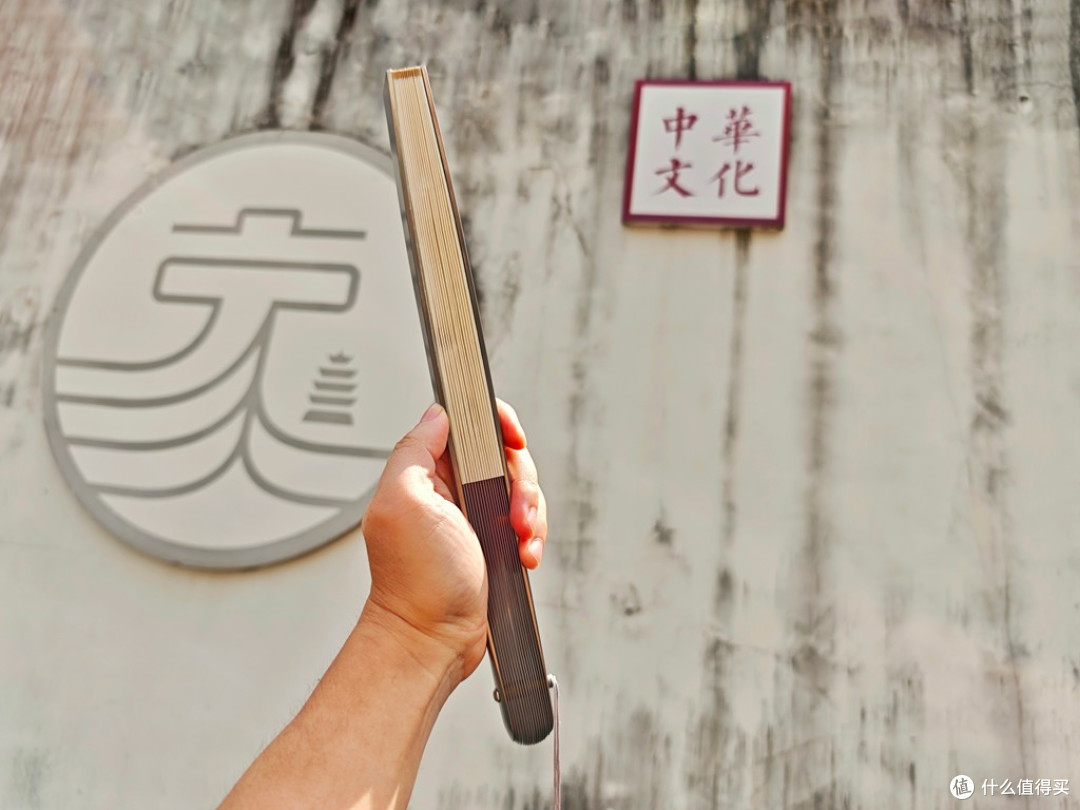 刚柔并济的东方美学:费戈轻风茄头钛扇