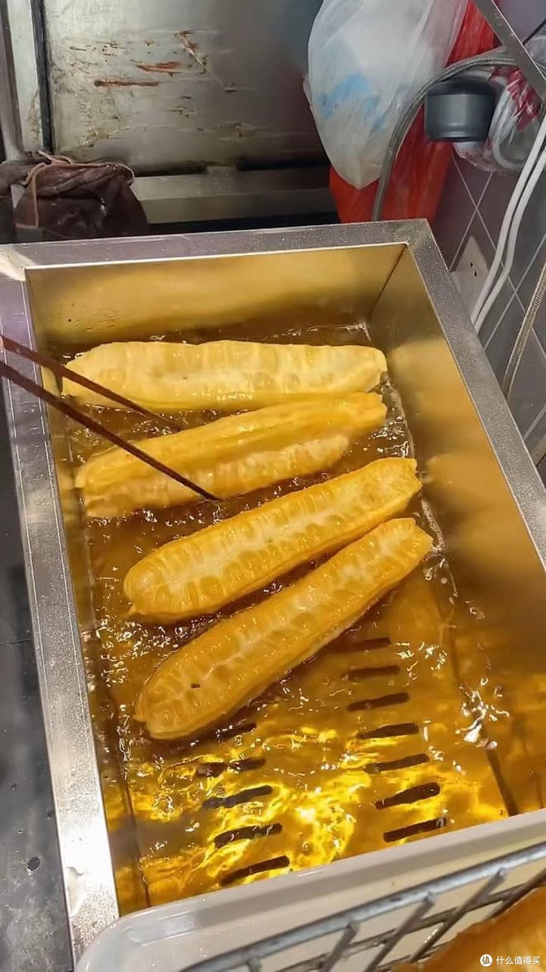炸油条用什么油颜色好看又好吃?