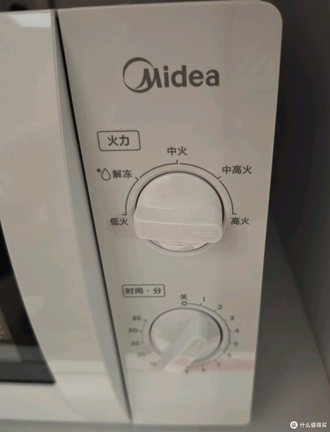 美的机械旋钮微波炉:高效加热三餐