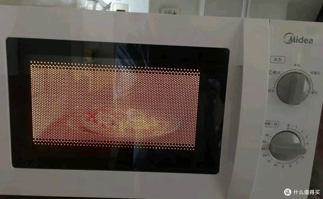美的机械旋钮微波炉:高效加热三餐