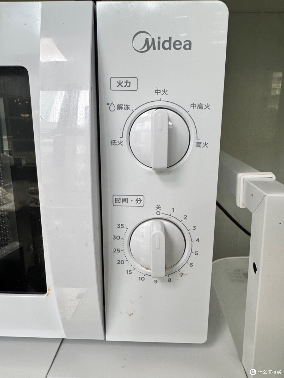 美的机械旋钮微波炉:简约高效