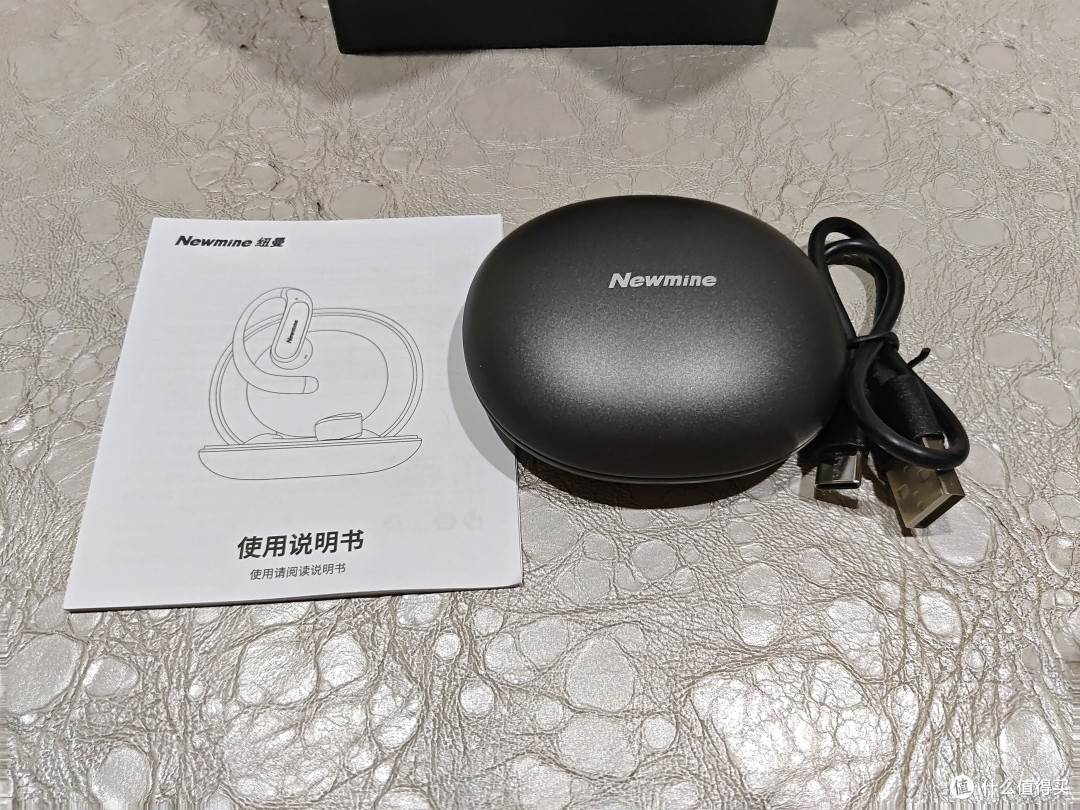 解放双耳新体验——纽曼挂耳式蓝牙耳机LY65