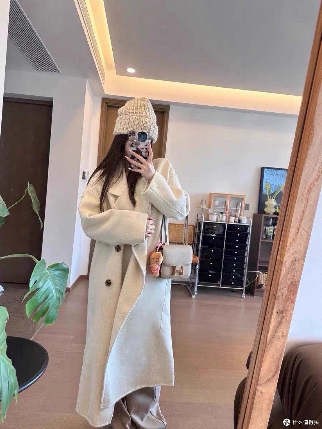 羊毛大衣VS羽绒棉服，寒潮天到底谁更能打？