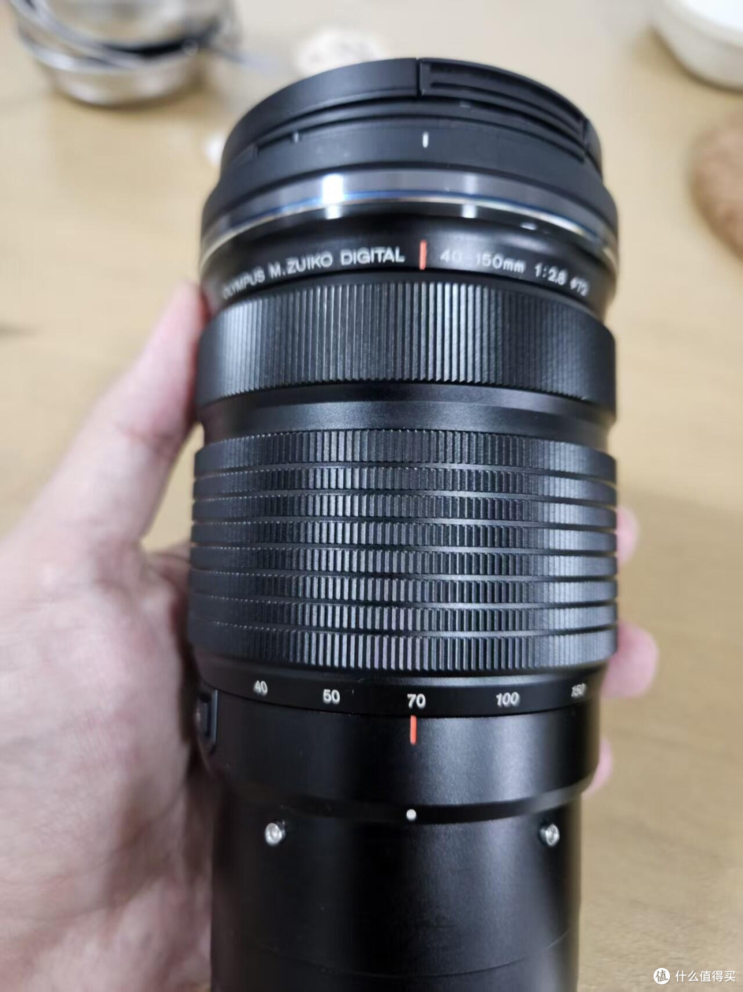 奥林巴斯40-150 F2.8纠结留不留?重镜头便携解法求助