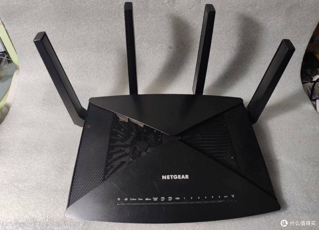 花260块捡了台网件R9000,万兆口+512M内存,刷OpenWrt后网速飙升