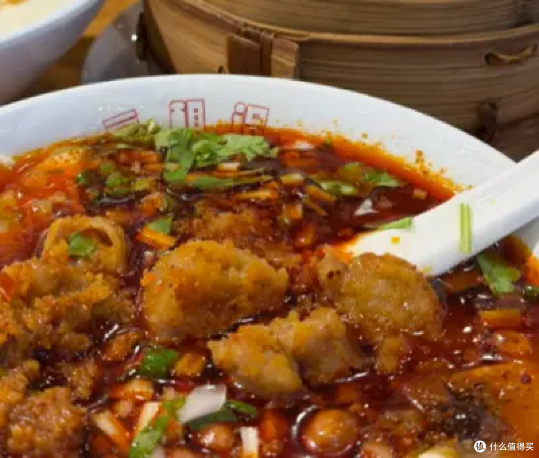 乐山豆腐脑调味平衡,咸香顺滑搭配酥肉绝佳