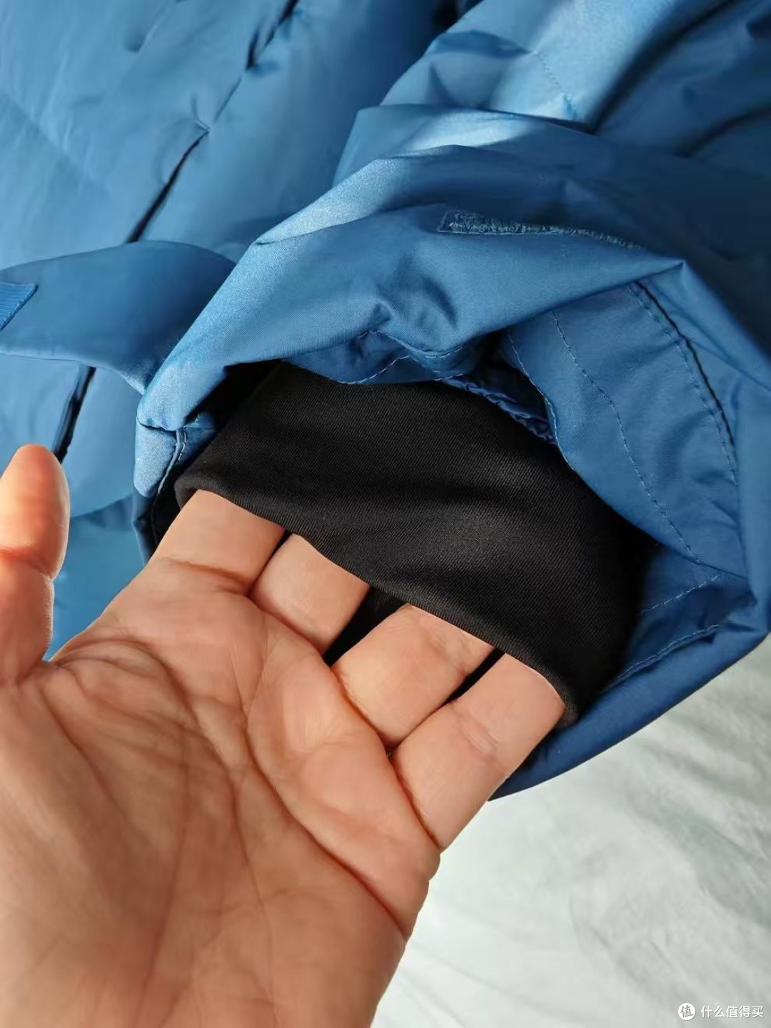 迪桑特中长款羽绒服,通勤保暖一件到位