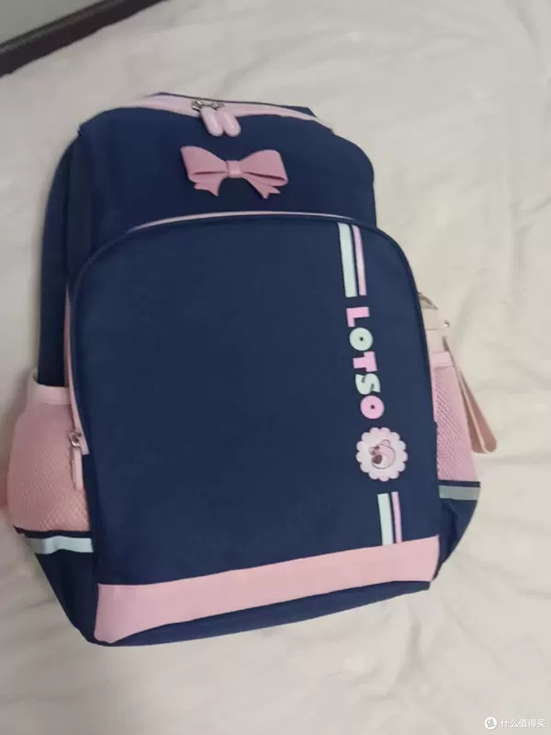 迪士尼浅粉书包的实用评测