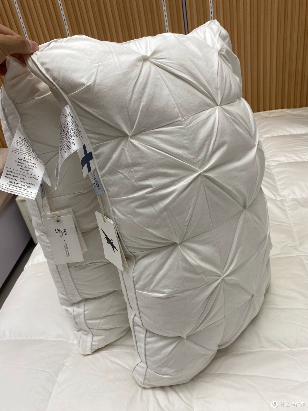 55元和75元的鹅绒枕,填充量写的是同一个数