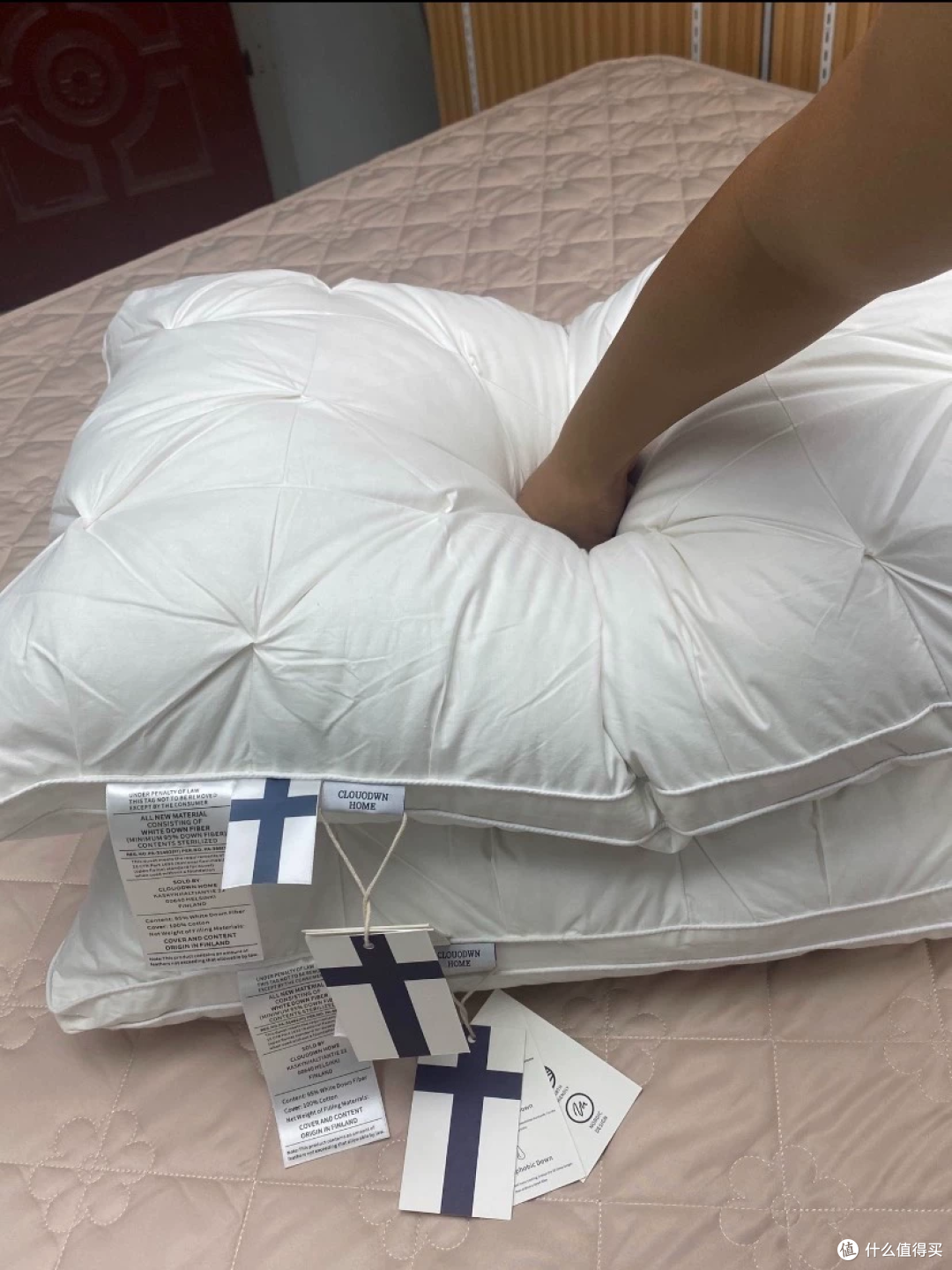 55元和75元的鹅绒枕,填充量写的是同一个数