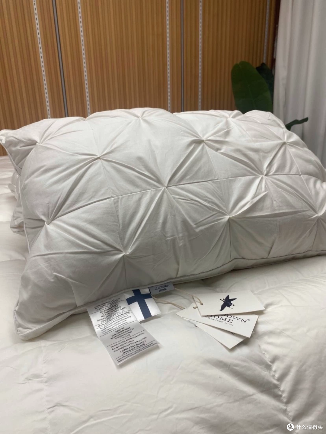 55元和75元的鹅绒枕,填充量写的是同一个数